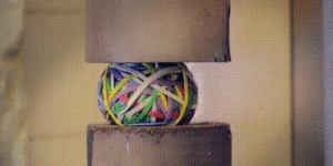 What+100%2C000+lb+of+force+looks+like+on+a+rubber+band+ball.