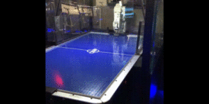 Playing air hockey against a robot