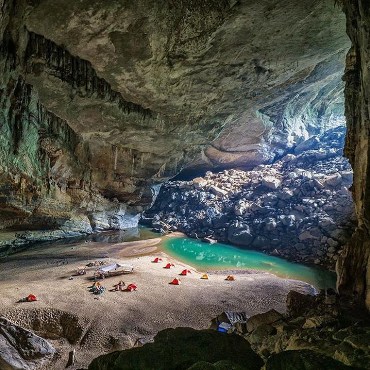 Camping inside the world's third largest cave in Phong Nha-Káº» BÃ ng National Park, Vietnam.