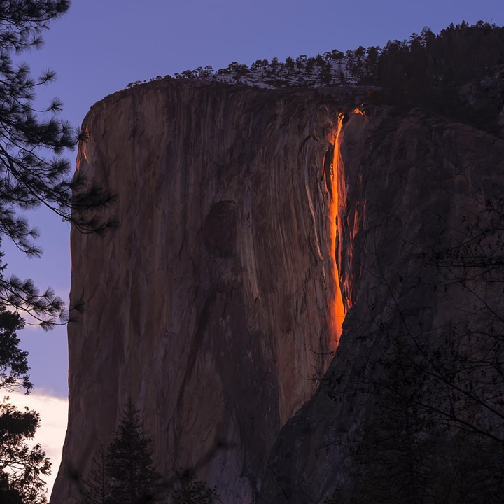 Every February, the sun hits the water just right at Yosemite National Park's Horsetail Falls, making the waterfall look like it's a river of fire.