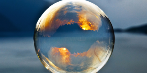 Sunrise reflected in a bubble.