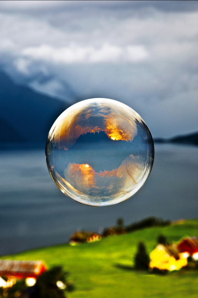 Sunrise reflected in a bubble.