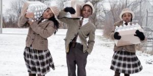 America in 2016. 3 siblings picking up their daily allowance of bottled water from the Fire Dept in Flint, MI.