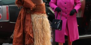 Queen Greeted by Fijian Warrior