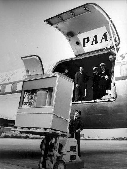 5MB IBM hard disk -- weighing over 1000kg -- being loaded into an airplane in 1956