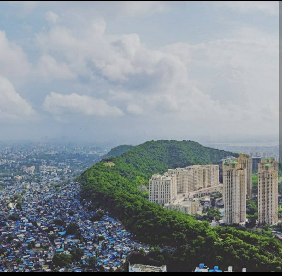 The poor and rich separated by a hill, Mumbai India.