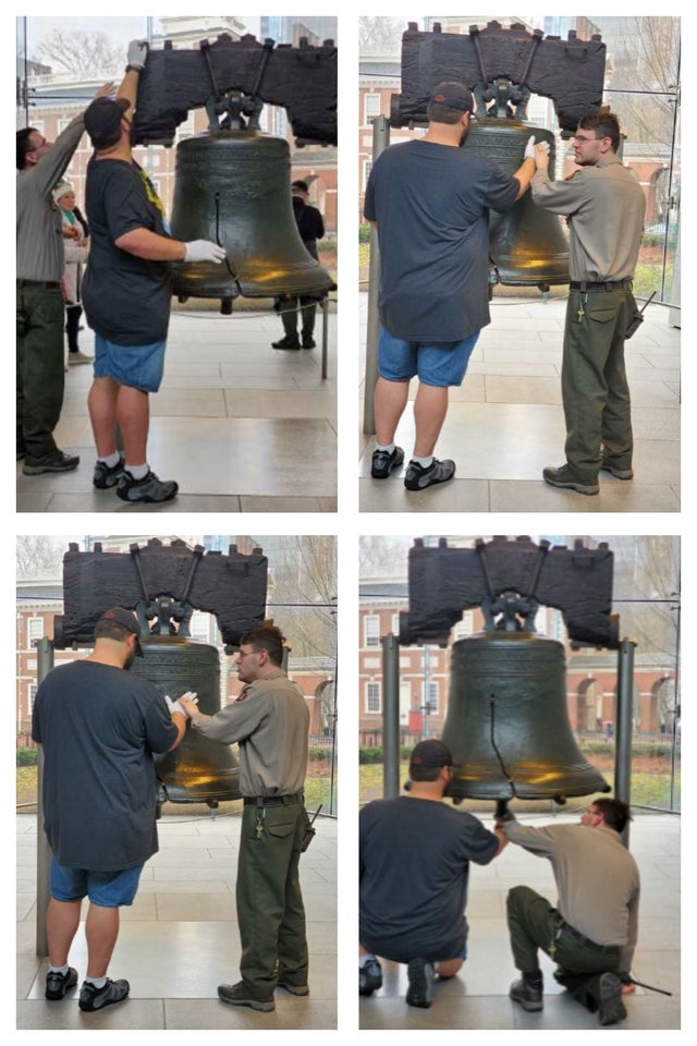 Bell center employee helps a blind citizen experience the liberty bell.