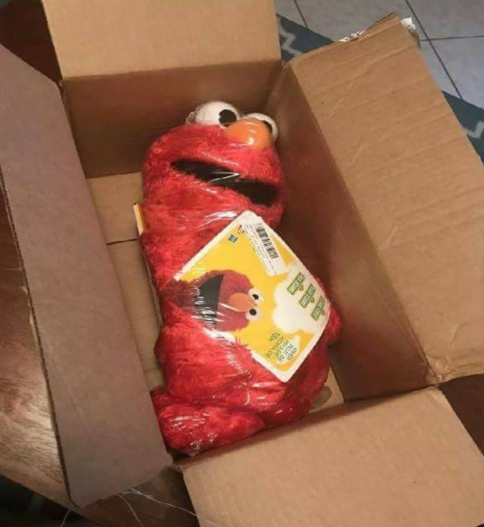 This Elmo arrived in the mail like someone in the Sesame Street mafia was trying to send a message...