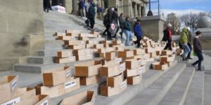 Idaho residents put coffins on the steps of the capitol to protest the faith-healing exemption which allows parents to deny children medical care.