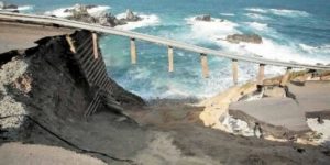 Bridge collapse due to massive land mass washing away underneath it in California