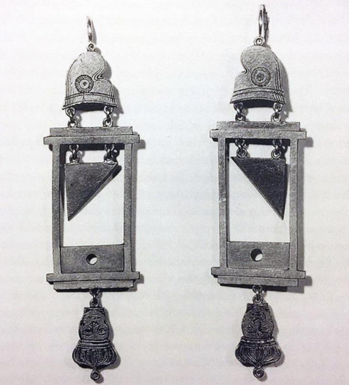 Guillotine earrings were very popular during The Reign of Terror in France, or so it's alleged. 