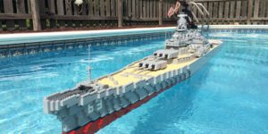 Life size LEGO Battleship in a pool.