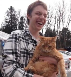 Blind guys first time holding kitty.