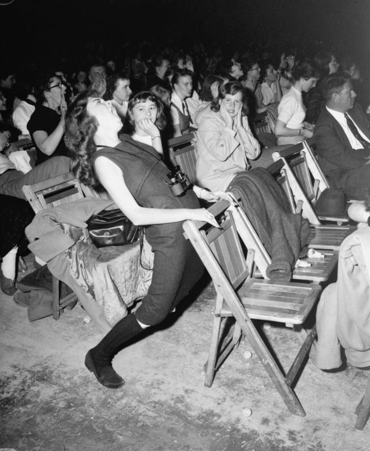 A teenager at an Elvis Presley concert, 1957