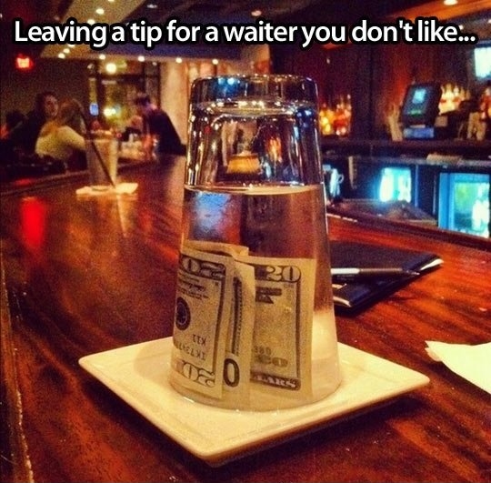 Leaving a tip for the waiter you don't like.