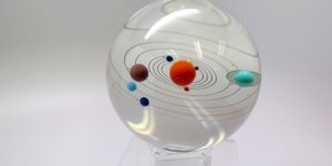 Handmade glass globe of the solar system. And Pluto.
