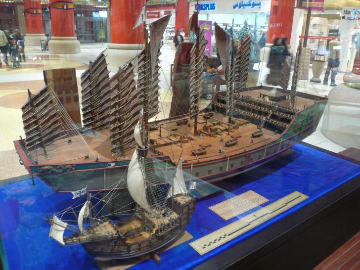 Chinese explorer Zheng He's ship compared to Christopher Columbus' Santa Maria. Both lived and sailed at the same time.