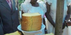 This couple couldn’t afford a wedding cake so they settled for what they could afford– bread and butter.