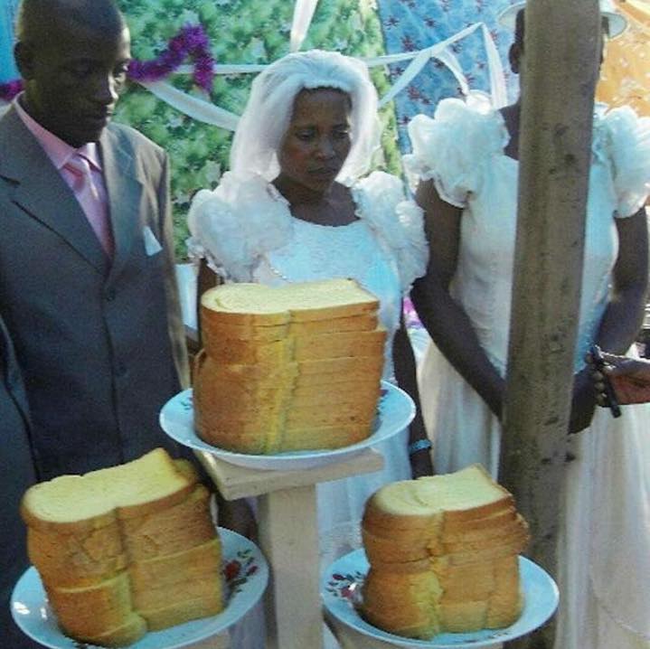 This couple couldn't afford a wedding cake so they settled for what they could afford-- bread and butter.