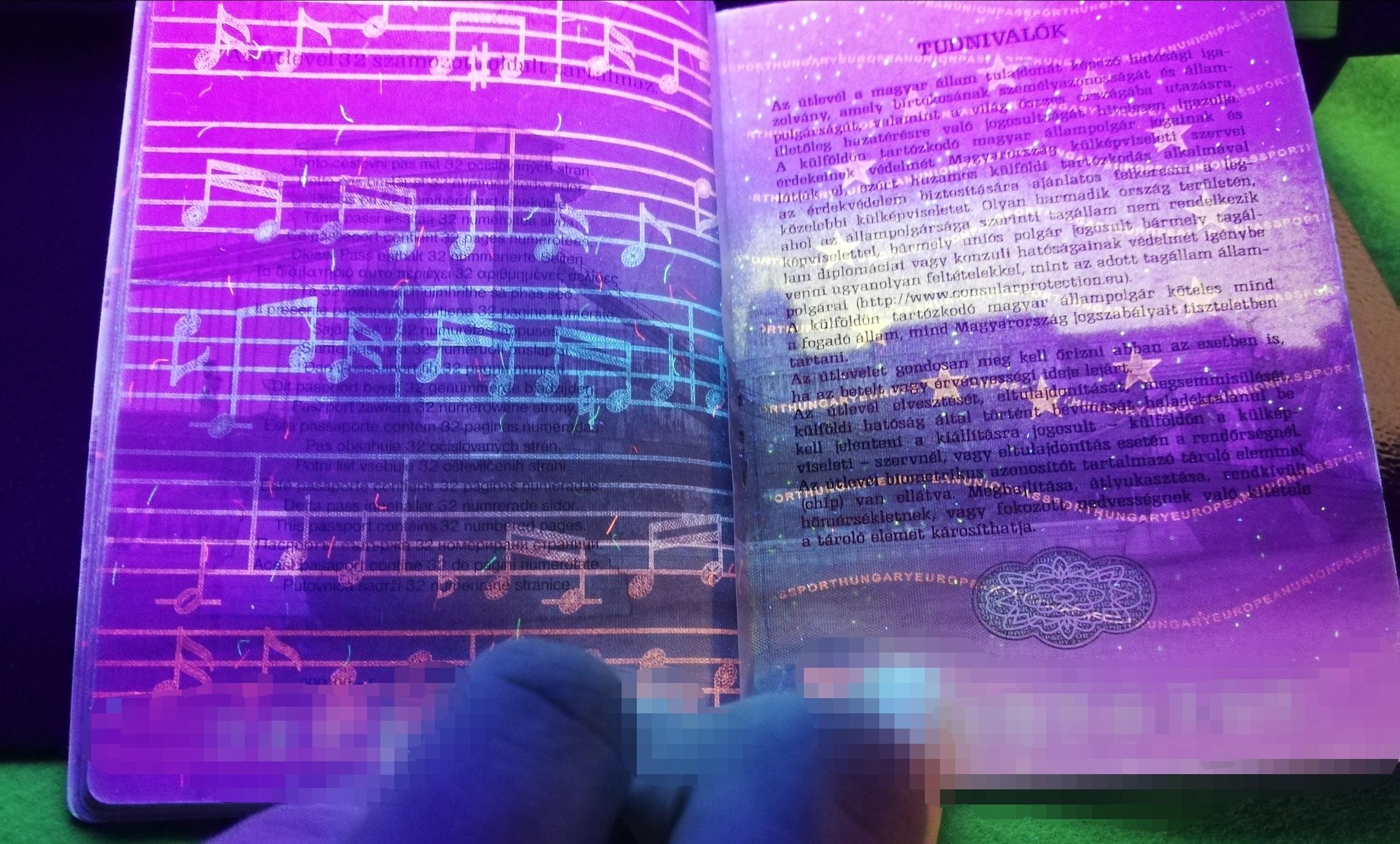 This passport's security features is the national anthem visible under a UV light.