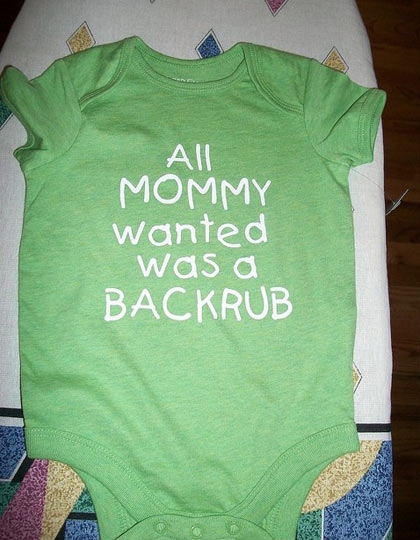 Honest onesie tells how it happened.