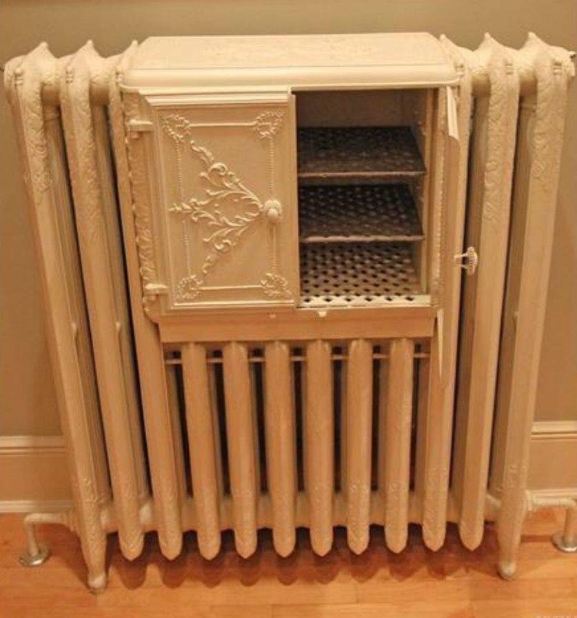 A Victorian radiator with a built in bread warmer.