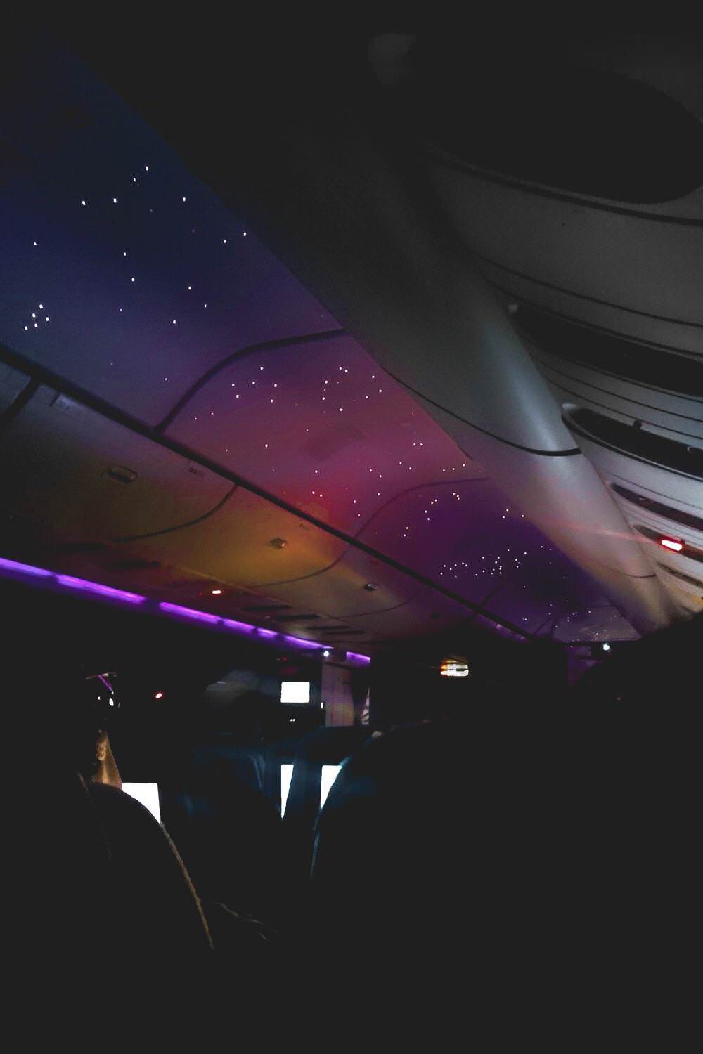 Airplane with soothing night lights.