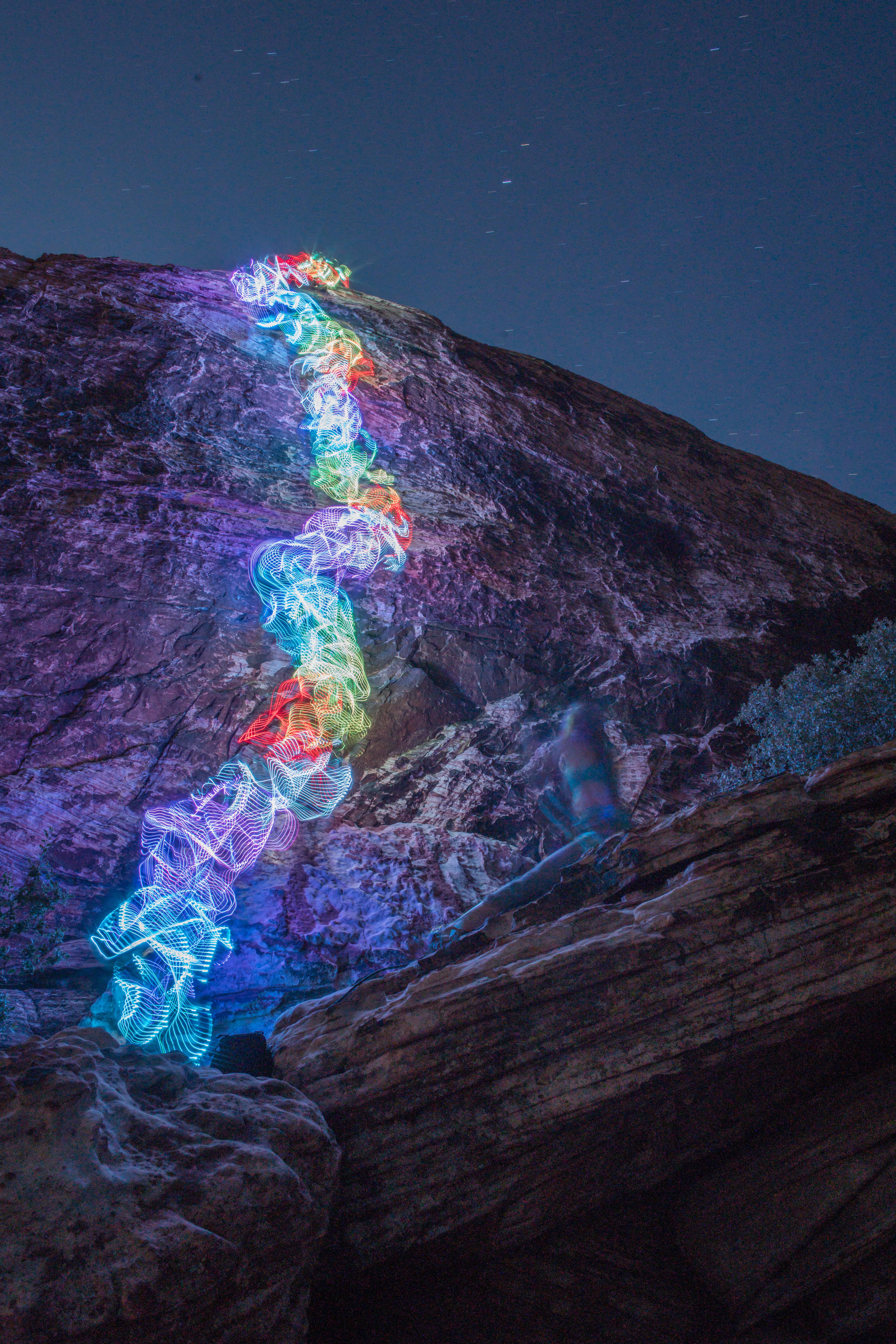 Long exposure LED rock climbing.