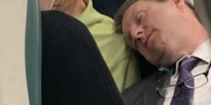 A decent guy let an exhausted business man sleep on him during his commute.