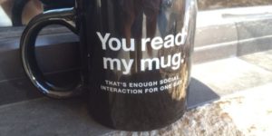 You read my mug.