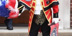 The town crier delivering the news about the Royal birth