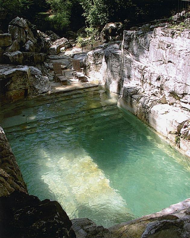 Backyard pool built into the existing limestone quarry.