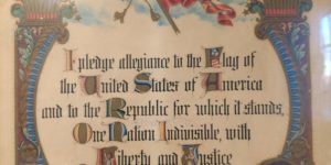Antique Pledge of Allegiance poster seems to be missing something…