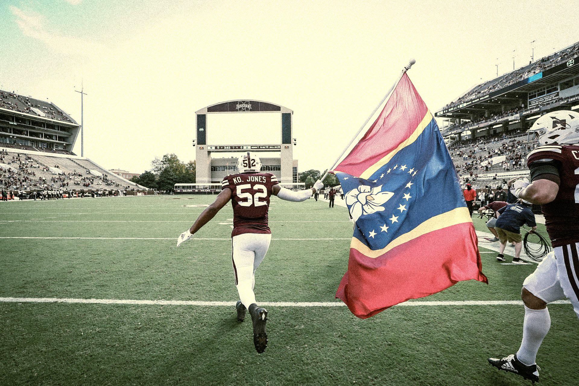 The Mississippi flag being run onto the field, 2020