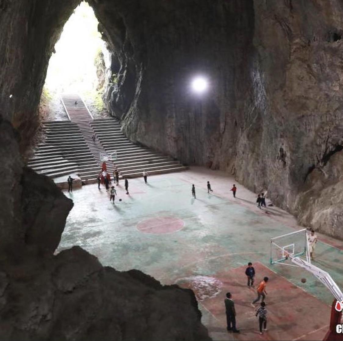 Just a basketball court in a cave.