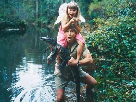 A man, his daughter, and a crocodile.