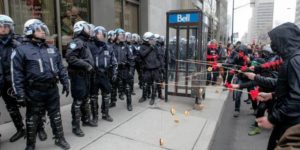 Protesters taunting police with donuts