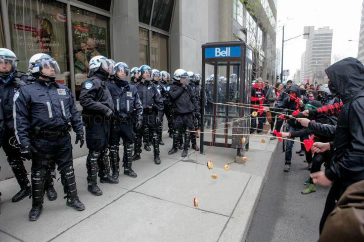 Protesters taunting police with donuts