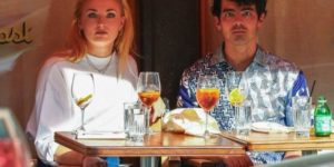 Sophie Turner and Joe Jonas staring at paparazzi.