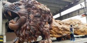 Giant lion carved out of a redwood tree trunk