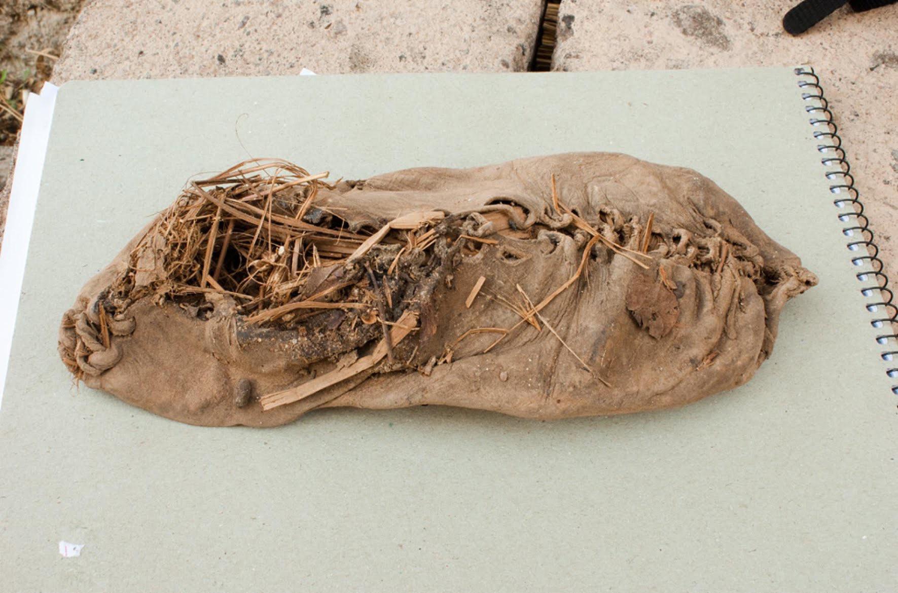 5,500 year old shoe preserved by sheep dung and low humidity.