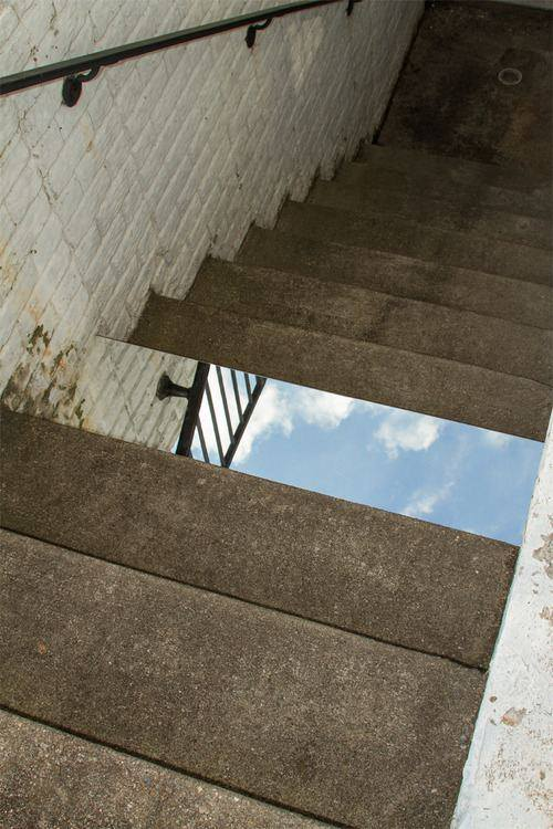 Put a mirror on the stairs, scare everyone...