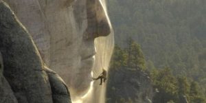 Pressure washing Mount Rushmore.