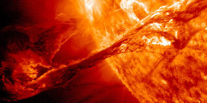 NASA photo of a solar filament. Earth for scale.