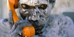 An Aboriginal Man using a Phone for the 1st time