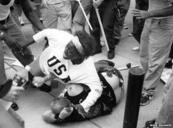 Then 18 year old Keshia Thomas throws herself on a KKK member to prevent his death from a mob of KKK protestors in Ann Arbor, Michigan.