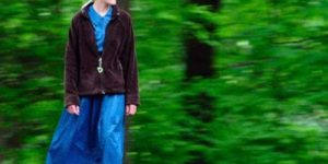 Amish woman skateboarding