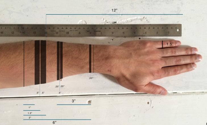 A functional tattoo concept that turns arm into a ruler.