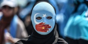Chinese Muslims against ethnic genocide.