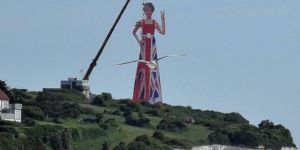 A massive structure of Teresa May flipping off mainland Europe has been erected on the Cliffs of Dover